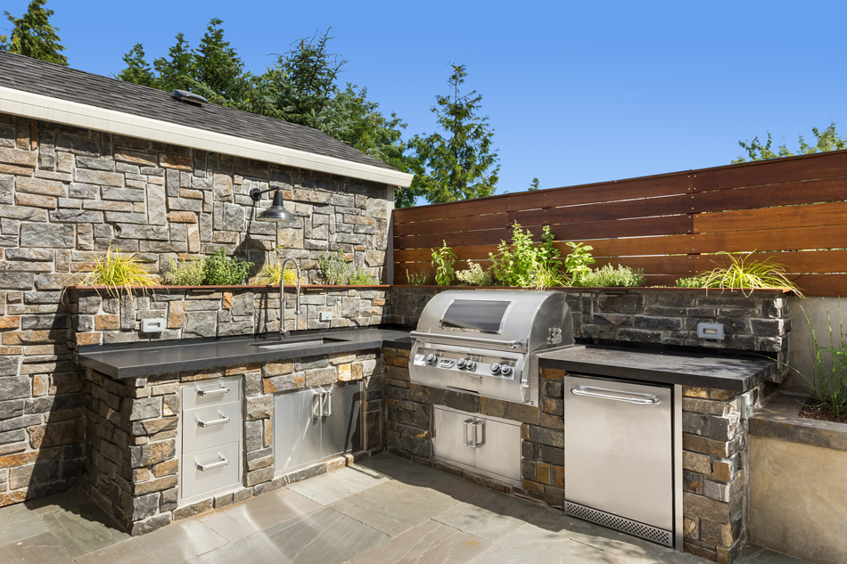 Backyard-hardscape-patio-with-outdoor-barbecue-and-kitchen-1211179492 Backyard hardscape entertainment area
