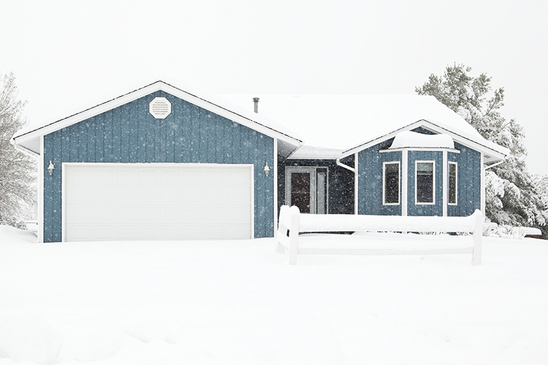 Winter storm with a snowed in driveway
